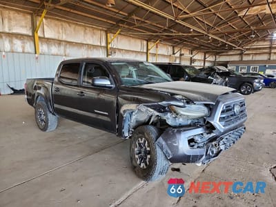 Czwarte zdjęcie samochodu z boku: 2019 TOYOTA TACOMA SR5 V6 VIN:3TMCZ5ANXKM211653 - miniatura