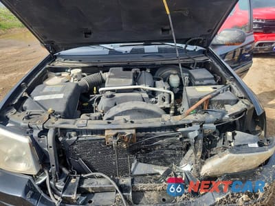 Zdjęcie 12 z 13 samochodu: 2004 GMC ENVOY XUV VIN:1GKET12S046206976 - miniatura