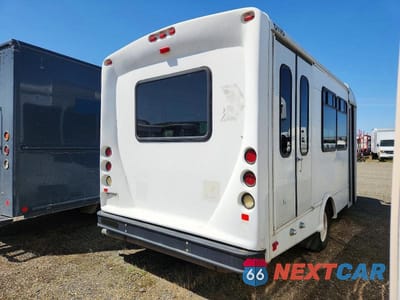 Czwarte zdjęcie samochodu z boku: 2012 FORD ECONOLINE VIN:1FDEE3FL4CDA82544 - miniatura