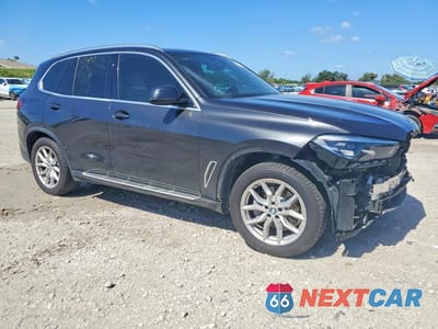 Czwarte zdjęcie samochodu z boku: 2021 BMW X5 XDRIVE40I VIN:5UXCR6C03M9G15792 - miniatura