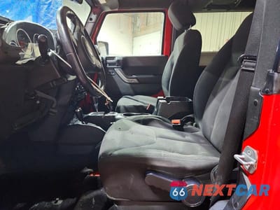Zdjęcie 7 z 14 samochodu: 2016 JEEP WRANGLER SPORT VIN:1C4AJWAG0GL128389 - miniatura