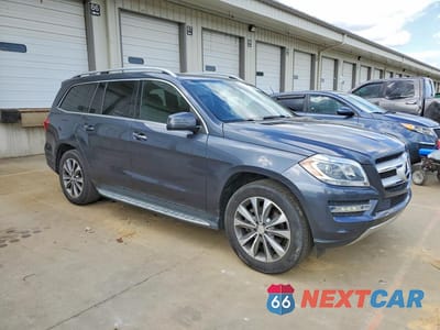 Czwarte zdjęcie samochodu z boku: 2015 MERCEDES-BENZ GL 450 4MATIC VIN:4JGDF6EE2FA498823 - miniatura