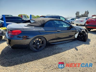Trzecie zdjęcie samochodu z tyłu: 2015 BMW M6 VIN:WBSLZ9C5XFD651483 - miniatura