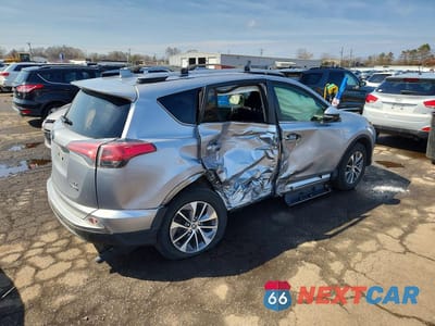 Trzecie zdjęcie samochodu z tyłu: 2018 TOYOTA RAV4 HYBRID XLE VIN:JTMRJREVXJD236419 - miniatura