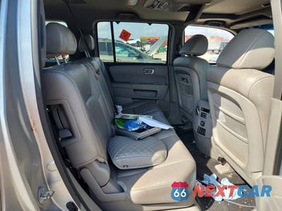 Zdjęcie 11 z 13 samochodu: 2011 HONDA PILOT TOURING VIN:5FNYF4H9XBB032454 - miniatura