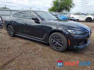 Czwarte zdjęcie samochodu z boku: 2024 BMW I4 EDRIVE 35 VIN:WBY43AW00RFT40375 - miniatura