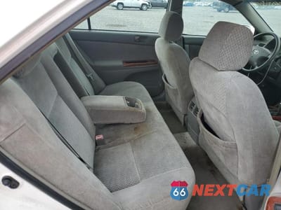 Zdjęcie 10 z 11 samochodu: 2004 TOYOTA CAMRY XLE VIN:4T1BE32K44U314979 - miniatura