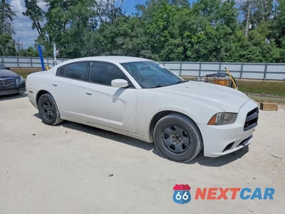 Czwarte zdjęcie samochodu z boku: 2012 DODGE CHARGER POLICE VIN:2C3CDXAG4CH190606 - miniatura