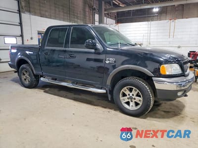 Czwarte zdjęcie samochodu z boku: 2003 FORD F150 SUPERCREW VIN:1FTRW08L03KB25738 - miniatura