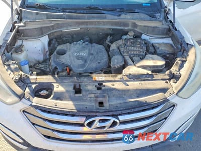 Zdjęcie 12 z 13 samochodu: 2013 HYUNDAI SANTA FE SPORT 2.4L VIN:5XYZUDLB6DG004151 - miniatura