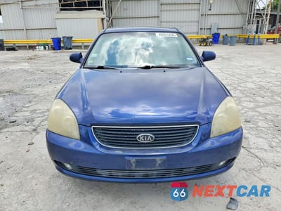 Piąte zdjęcie samochodu w środku: 2007 KIA OPTIMA LX VIN:KNAGE124375126093 - miniatura