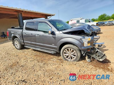 Czwarte zdjęcie samochodu z boku: 2015 FORD F150 SUPERCREW VIN:1FTEW1CG6FFB76706 - miniatura