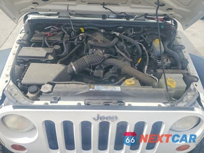 Zdjęcie 11 z 12 samochodu: 2010 JEEP WRANGLER SPORT VIN:1J4AA2D12AL136222 - miniatura