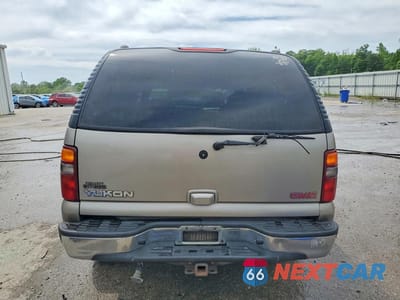 Zdjęcie 6 z 13 samochodu: 2002 GMC YUKON VIN:1GKEC13V42R251696 - miniatura