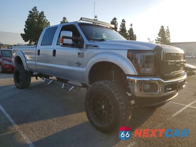 Czwarte zdjęcie samochodu z boku: 2012 FORD F350 SUPER DUTY VIN:1FT8W3BT0CEA15387 - miniatura