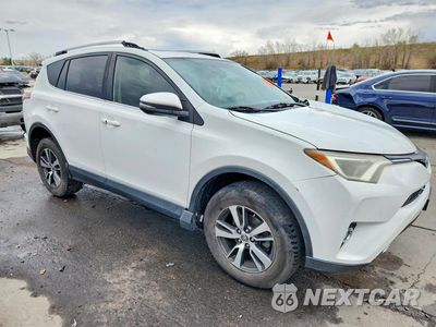 Czwarte zdjęcie samochodu z boku: 2016 TOYOTA RAV4 XLE VIN:JTMWFREV7GJ073694 - miniatura