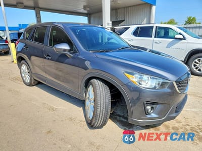 Czwarte zdjęcie samochodu z boku: 2014 MAZDA CX-5 GT VIN:JM3KE4DY5E0302190 - miniatura