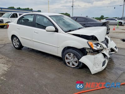Czwarte zdjęcie samochodu z boku: 2011 KIA RIO LX VIN:KNADH4A33B6949467 - miniatura