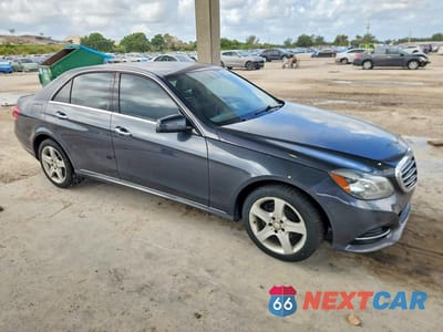 Czwarte zdjęcie samochodu z boku: 2014 MERCEDES-BENZ E 350 4MATIC VIN:WDDHF8JB6EA817934 - miniatura