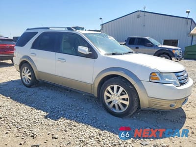 Czwarte zdjęcie samochodu z boku: 2008 FORD TAURUS X EDDIE BAUER VIN:1FMDK08W58GA24927 - miniatura