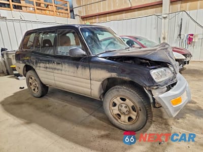 Czwarte zdjęcie samochodu z boku: 2000 TOYOTA RAV4 BASE VIN:JT3HP10V6Y7169270 - miniatura