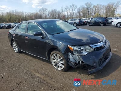 Czwarte zdjęcie samochodu z boku: 2012 TOYOTA CAMRY HYBRID XLE VIN:4T1BD1FK7CU029208 - miniatura