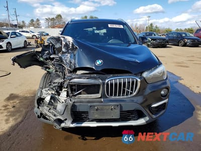 Piąte zdjęcie samochodu w środku: 2018 BMW X1 XDRIVE28I VIN:WBXHT3C38J5L26315 - miniatura