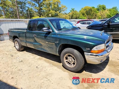 Czwarte zdjęcie samochodu z boku: 1999 DODGE DAKOTA VIN:1B7GL22X2XS279123 - miniatura