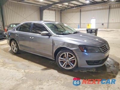 Czwarte zdjęcie samochodu z boku: 2015 VOLKSWAGEN PASSAT SE VIN:1VWBV7A34FC051551 - miniatura