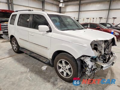 Czwarte zdjęcie samochodu z boku: 2009 HONDA PILOT TOURING VIN:5FNYF38879B020791 - miniatura