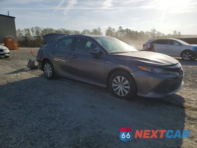 Czwarte zdjęcie samochodu z boku: 2019 TOYOTA CAMRY HYBRID LE VIN:4T1B31HK6KU510405 - miniatura