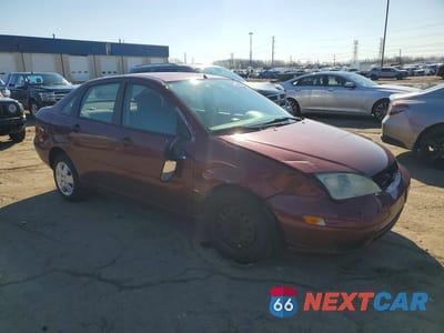 Czwarte zdjęcie samochodu z boku: 2006 FORD FOCUS VIN:1FAFP34N56W223160 - miniatura
