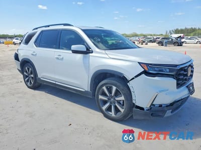 Czwarte zdjęcie samochodu z boku: 2024 HONDA PILOT TOURING VIN:5FNYG1H72RB023817 - miniatura