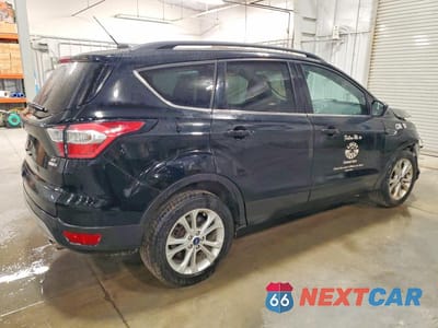 Trzecie zdjęcie samochodu z tyłu: 2017 FORD ESCAPE SE VIN:1FMCU9G94HUD32162 - miniatura