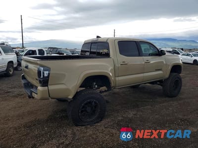 Trzecie zdjęcie samochodu z tyłu: 2016 TOYOTA TACOMA SR V6 VIN:3TMCZ5AN0GM040144 - miniatura