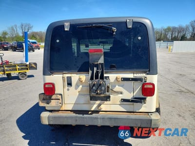 Zdjęcie 6 z 12 samochodu: 2004 JEEP WRANGLER / TJ SPORT VIN:1J4F449S34P802463 - miniatura