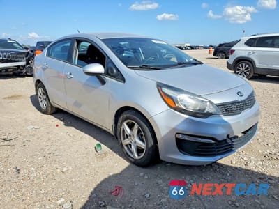Czwarte zdjęcie samochodu z boku: 2016 KIA RIO LX VIN:KNADM4A36G6640322 - miniatura
