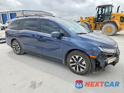 Czwarte zdjęcie samochodu z boku: 2025 HONDA ODYSSEY EXL VIN:5FNRL6H69SB037689 - miniatura