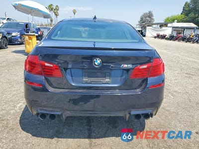 Zdjęcie 6 z 12 samochodu: 2016 BMW M5 VIN:WBSFV9C52GD595744 - miniatura