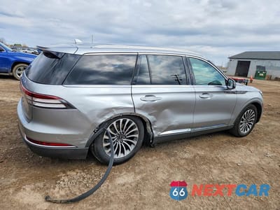 Trzecie zdjęcie samochodu z tyłu: 2020 LINCOLN AVIATOR RESERVE VIN:5LM5J7XC2LGL16967 - miniatura