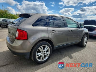 Trzecie zdjęcie samochodu z tyłu: 2012 FORD EDGE SEL VIN:2FMDK4JC0CBA76747 - miniatura