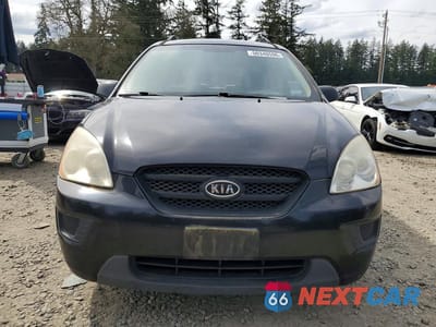 Piąte zdjęcie samochodu w środku: 2009 KIA RONDO BASE VIN:KNAFG528397225598 - miniatura