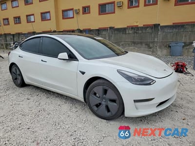 Czwarte zdjęcie samochodu z boku: 2021 TESLA MODEL 3 VIN:5YJ3E1EA6MF920941 - miniatura