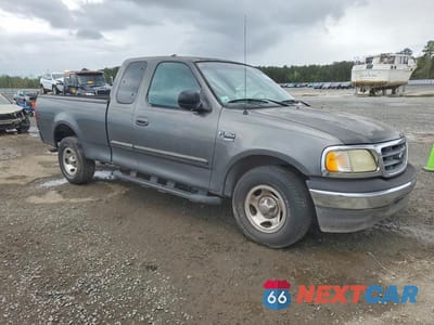 Czwarte zdjęcie samochodu z boku: 2003 FORD F150 VIN:1FTRX17W63NA88286 - miniatura
