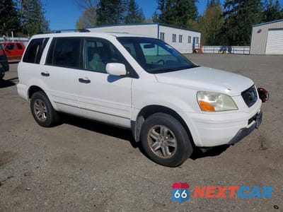 Czwarte zdjęcie samochodu z boku: 2005 HONDA PILOT EXL VIN:2HKYF18575H561457 - miniatura