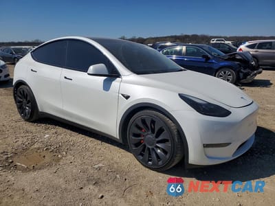 Czwarte zdjęcie samochodu z boku: 2023 TESLA MODEL Y VIN:7SAYGDEF9PF810941 - miniatura
