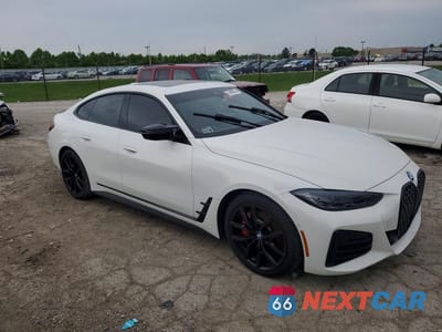 Czwarte zdjęcie samochodu z boku: 2023 BMW M440XI GRAN COUPE VIN:WBA13AW08PFN57302 - miniatura