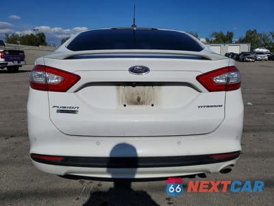 Zdjęcie 6 z 12 samochodu: 2016 FORD FUSION TITANIUM PHEV VIN:3FA6P0SU2GR241693 - miniatura