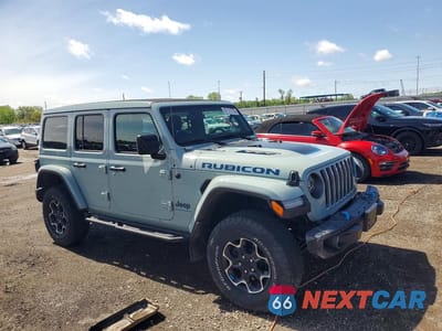 Czwarte zdjęcie samochodu z boku: 2023 JEEP WRANGLER RUBICON 4XE VIN:1C4JJXR64PW566574 - miniatura