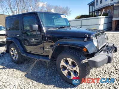 Czwarte zdjęcie samochodu z boku: 2018 JEEP WRANGLER SAHARA VIN:1C4AJWBG5JL910094 - miniatura